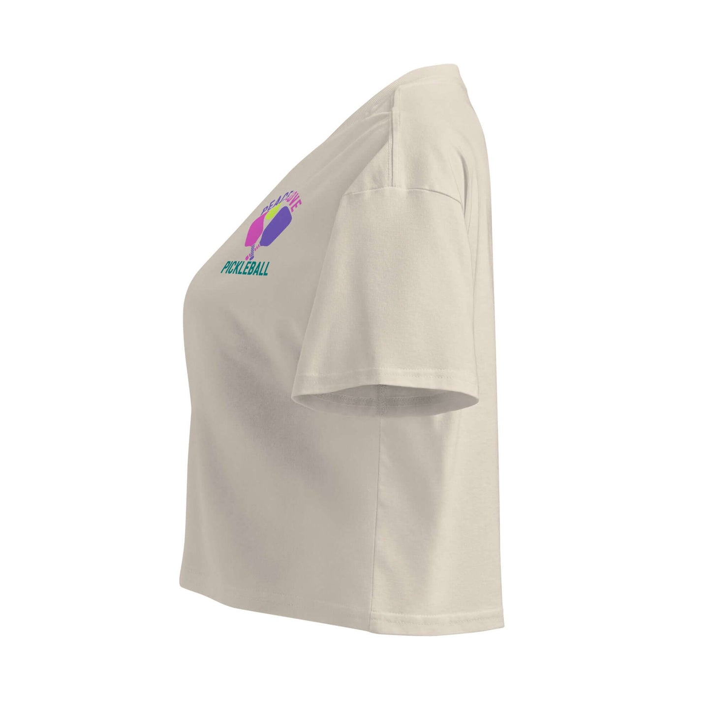Women's Peace, Love, Pickleball Crop Top in side view, showcasing sporty design and colorful graphics.