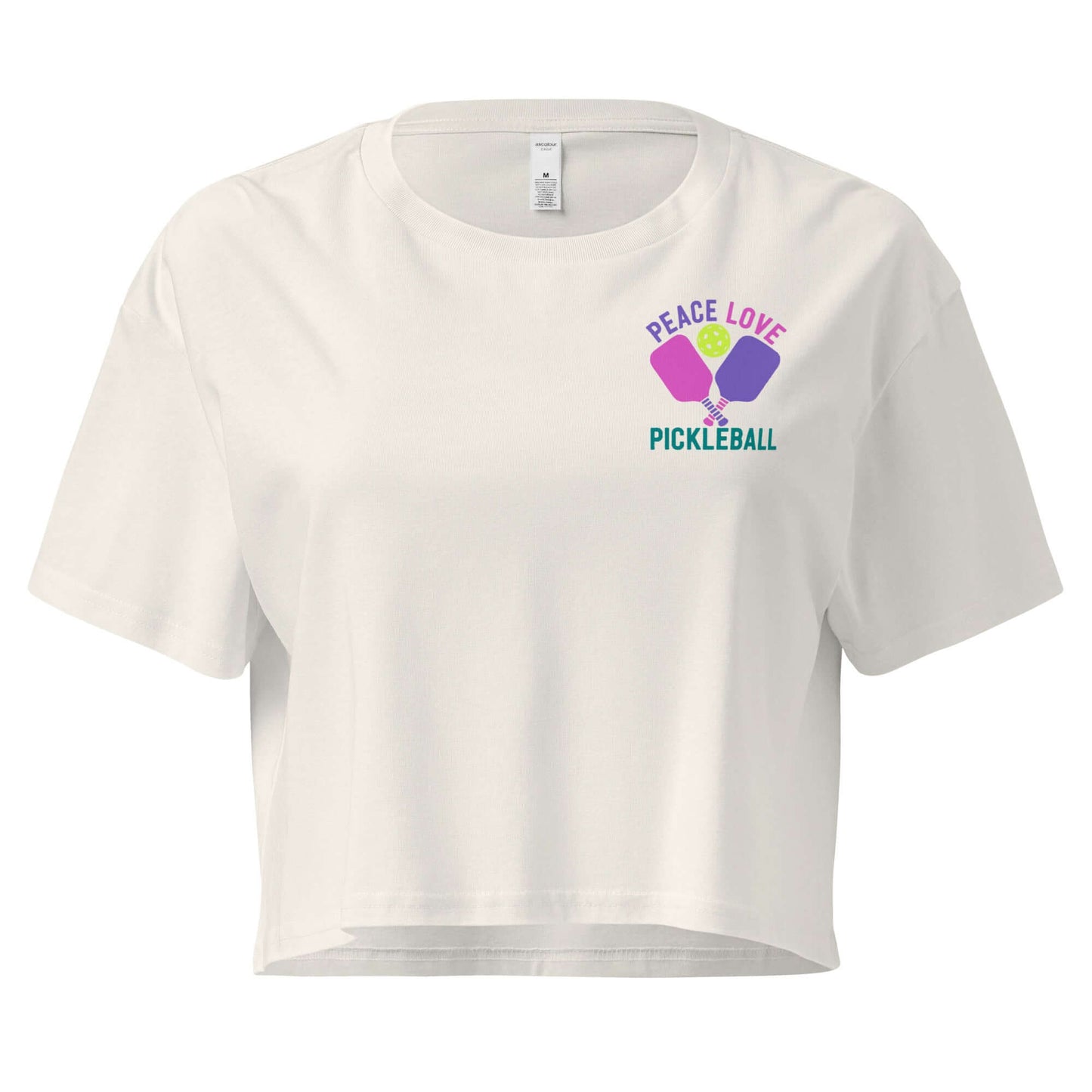 Women's Peace Love Pickleball Crop Top featuring a playful graphic design on a light-colored shirt.