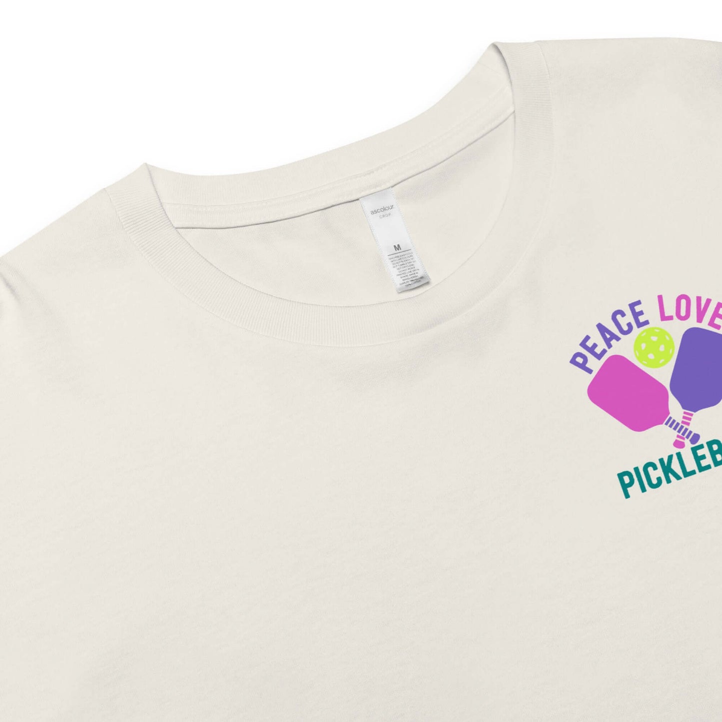 Women's Peace, Love, Pickleball Crop Top featuring colorful graphic and soft fabric for stylish comfort on and off the court.