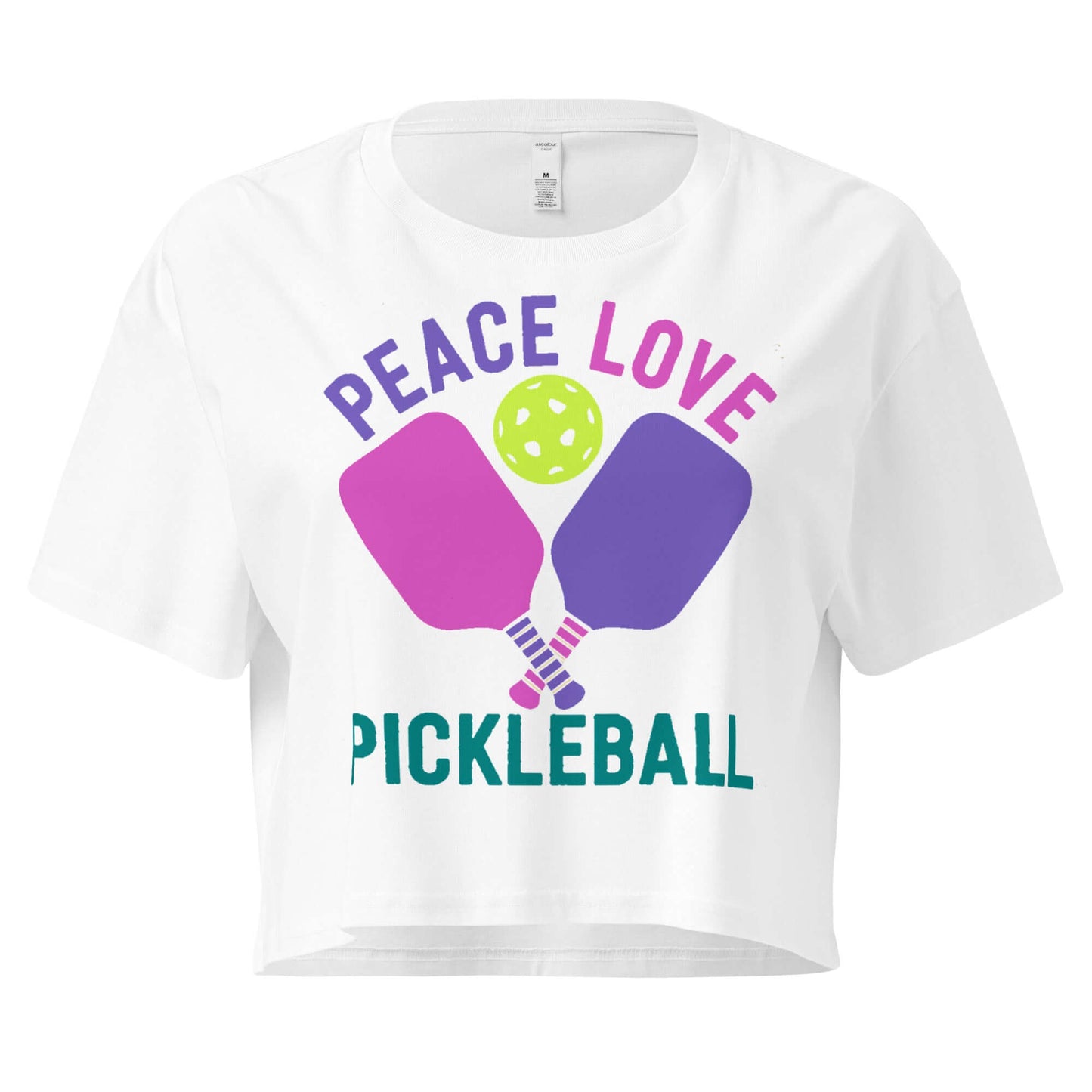 White women's crop top featuring 'Peace Love Pickleball' graphic with paddles and a ball.