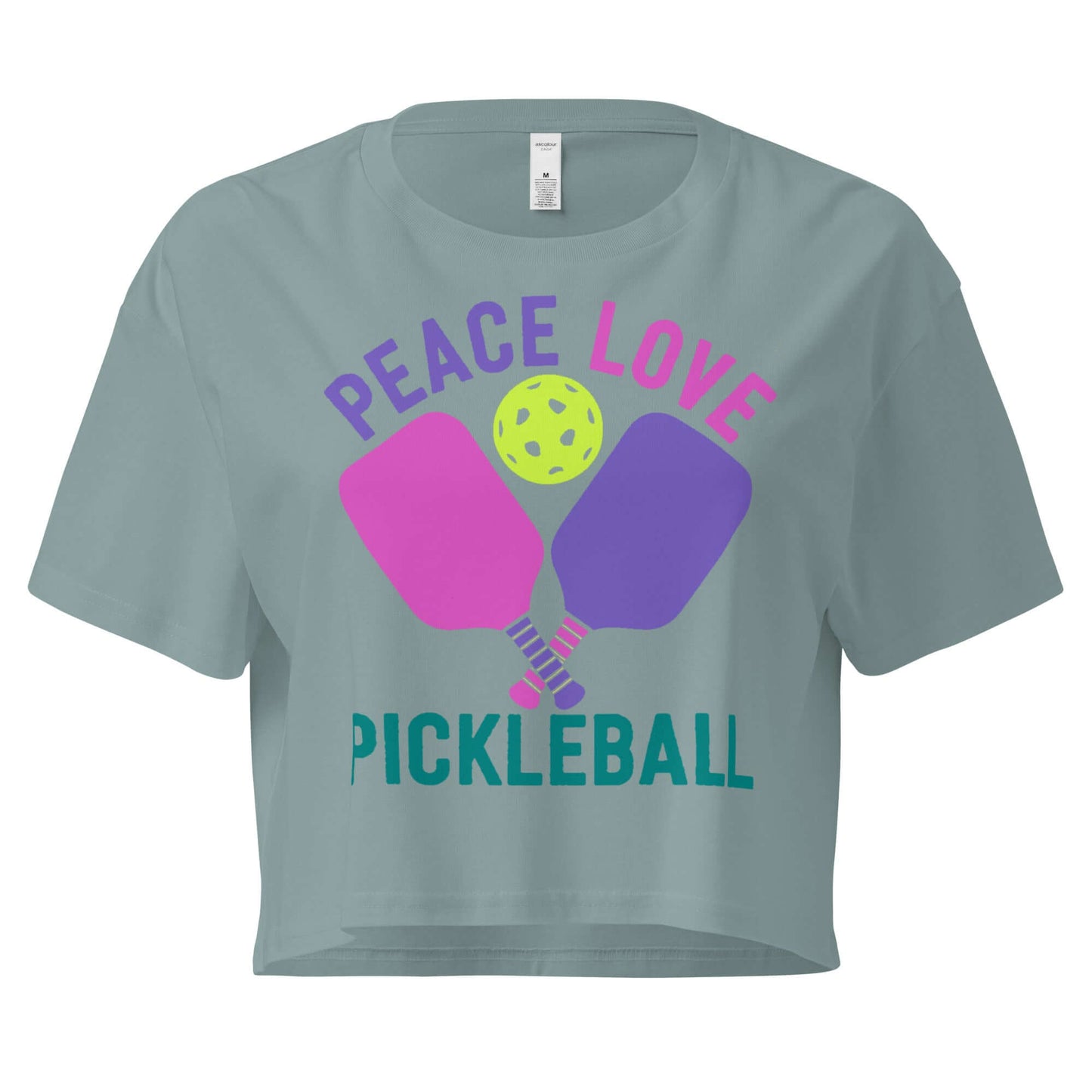 Women’s Peace, Love, Pickleball crop top featuring vibrant design and paddles, perfect for active and stylish play.