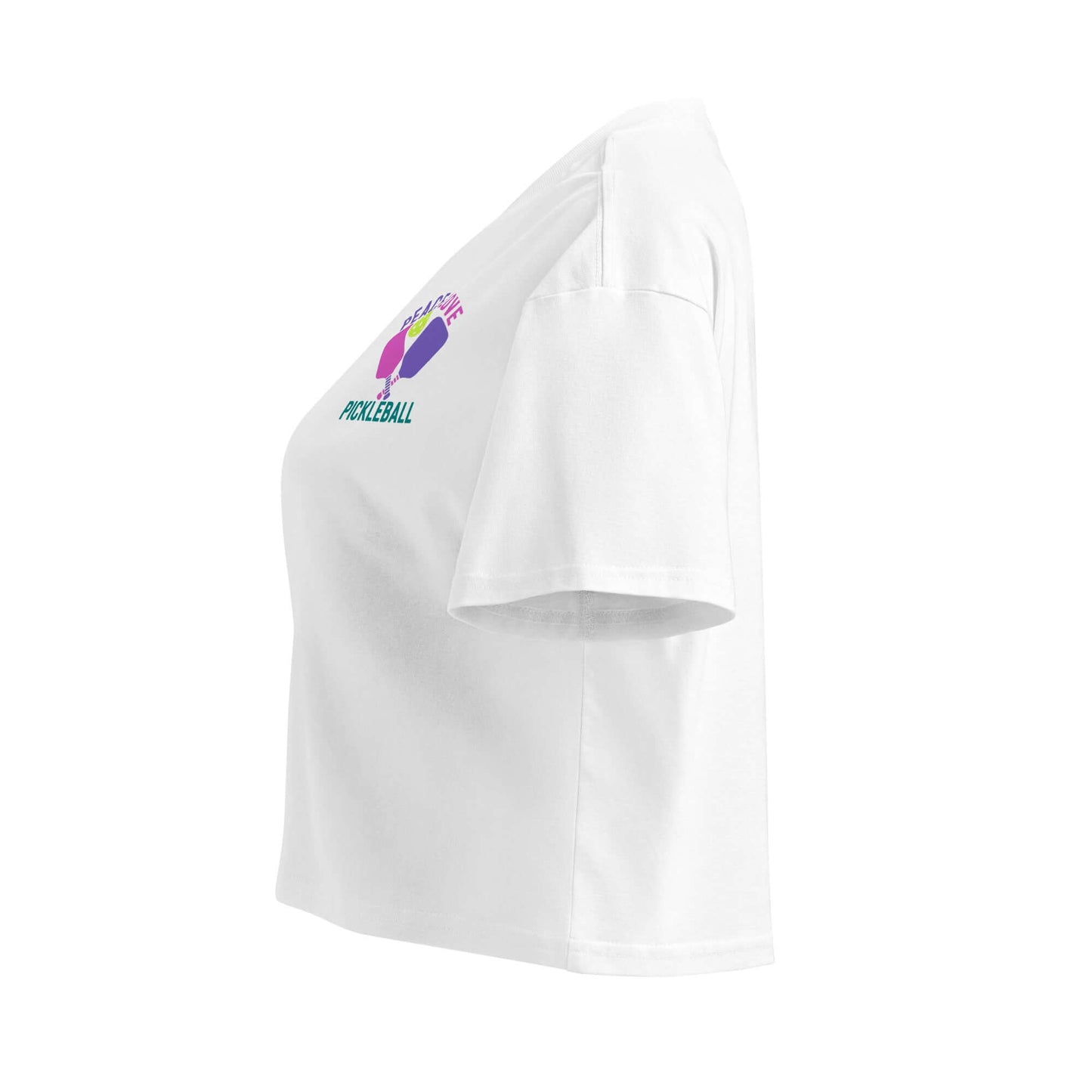 Women's white crop top featuring a pickleball design, blending sporty style with a peace and love theme.