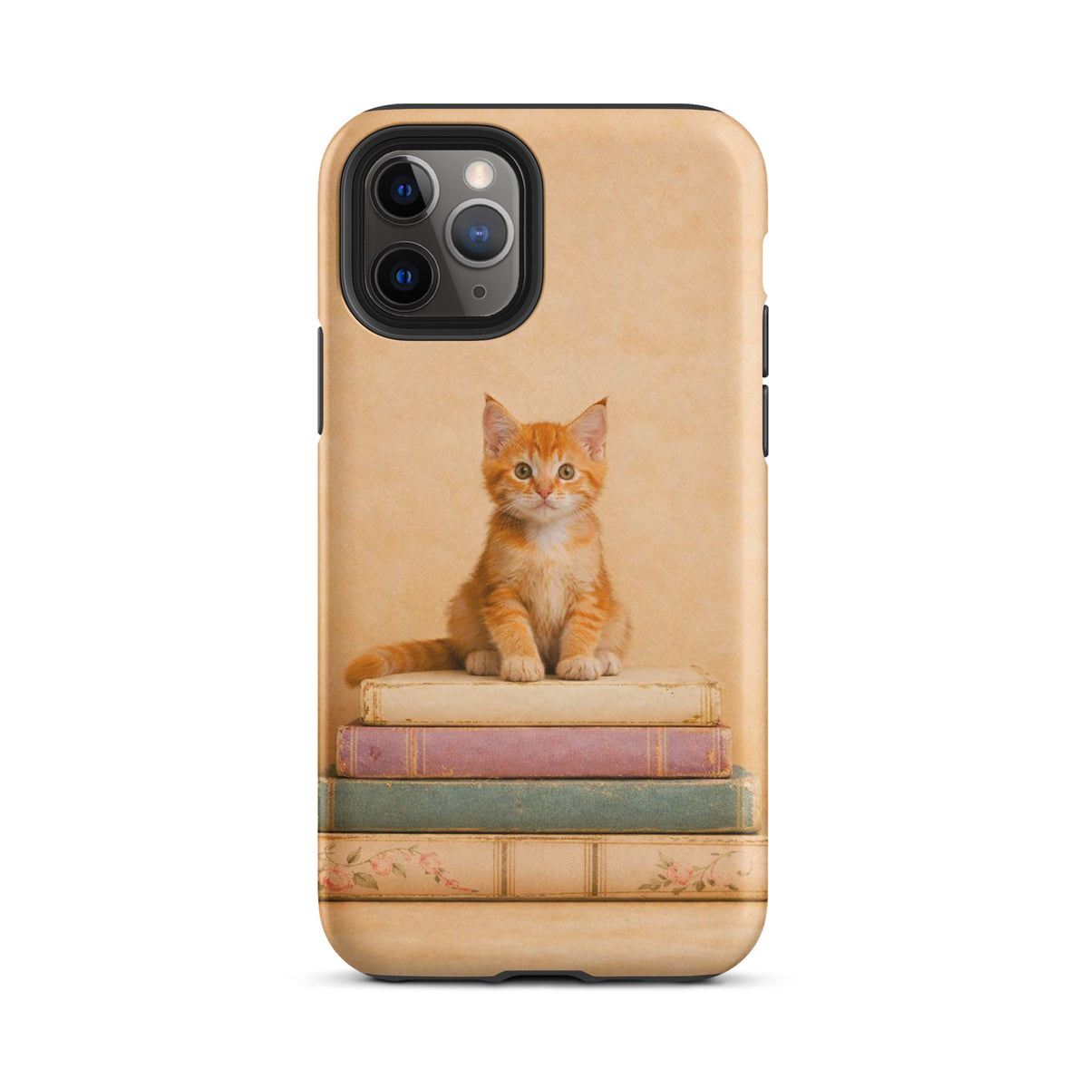 Phone Case for iPhone with cozy kitten and vintage books design featuring an orange tabby kitten on pastel books.