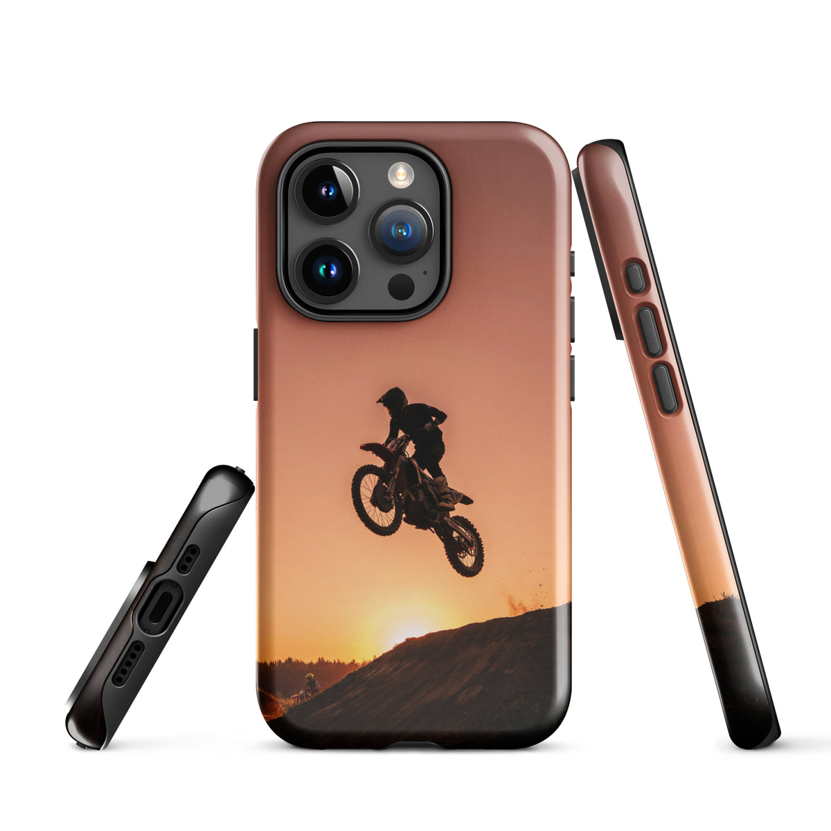 Phone Case for iPhone featuring motocross sunset dirt bike design with silhouette jump against a glowing sunset in warm copper tones.