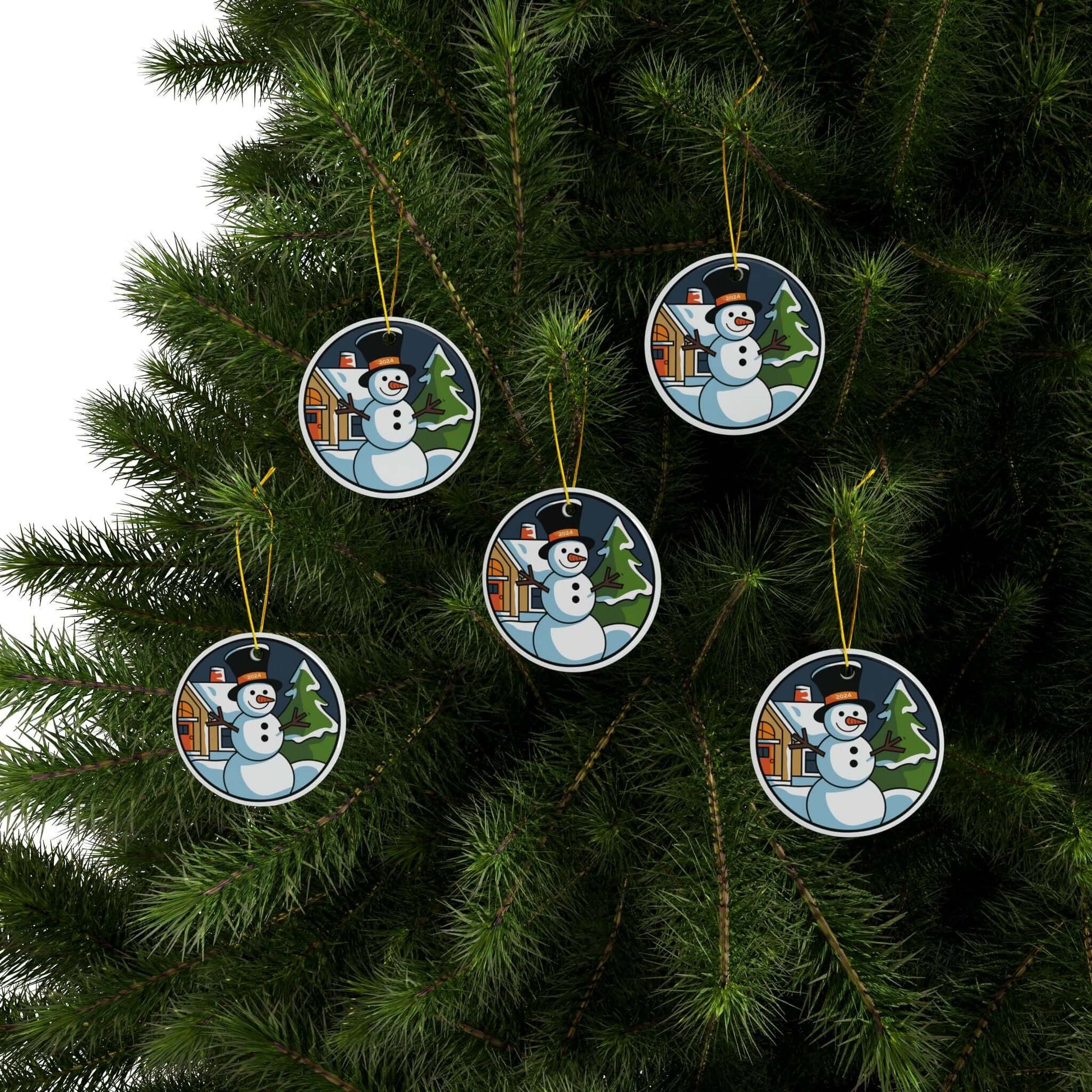Ceramic ornaments featuring snowman holiday scene on Christmas tree, set of five with two-sided print.