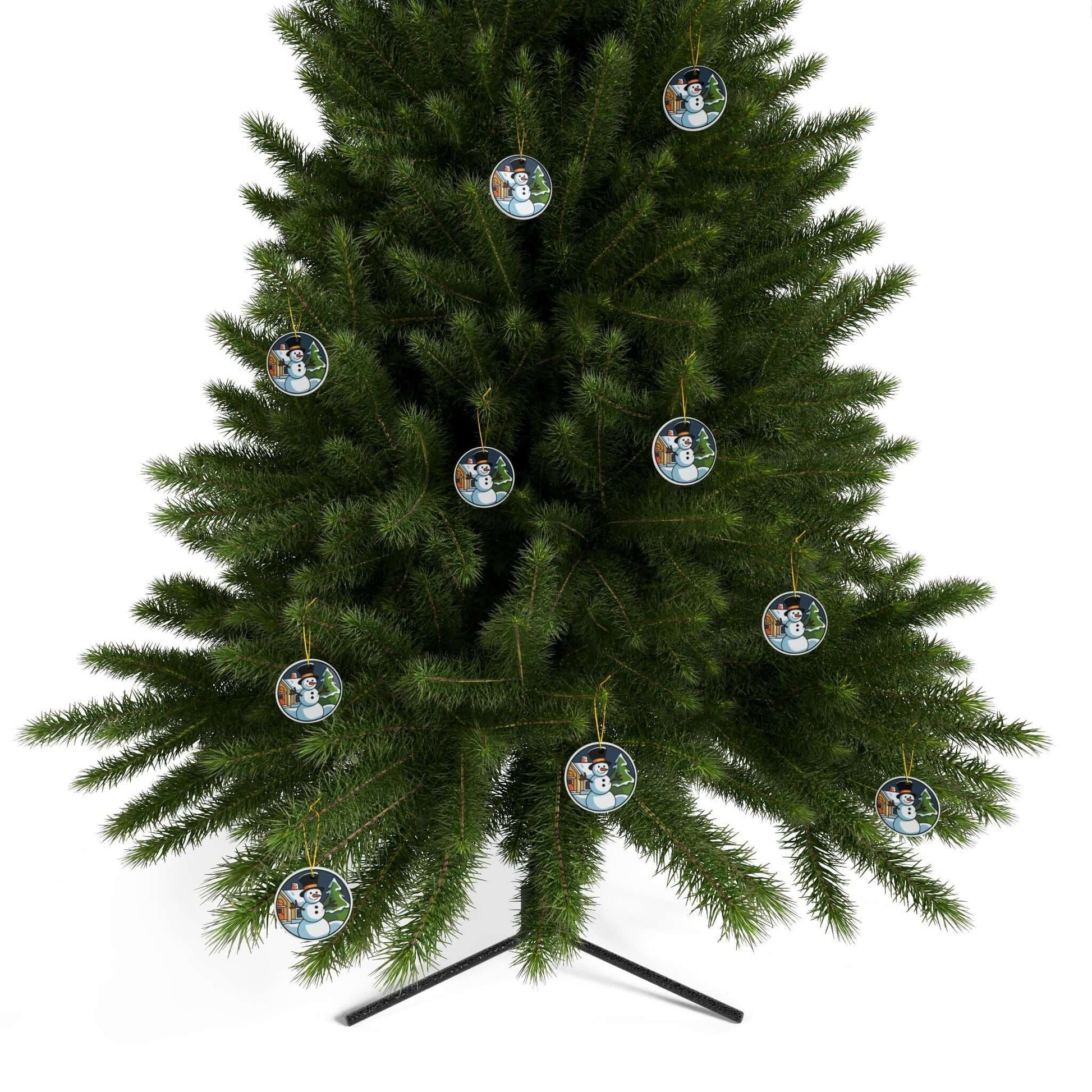 Christmas tree adorned with charming snowman holiday scene ceramic ornaments, featuring a two-sided print, creating a festive atmosphere.