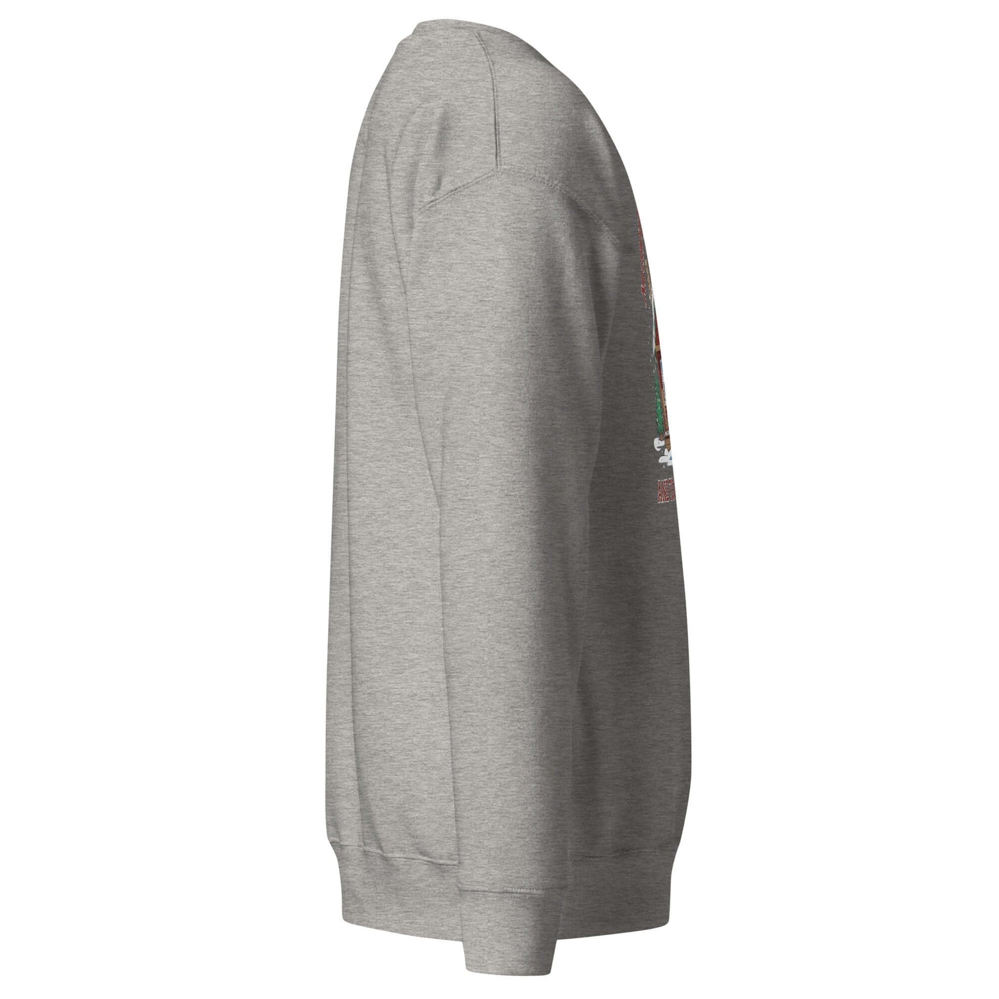 Side view of Cozy Pickleball Cabin Merry Dinks Holiday Sweatshirt showcasing festive design on gray fabric.