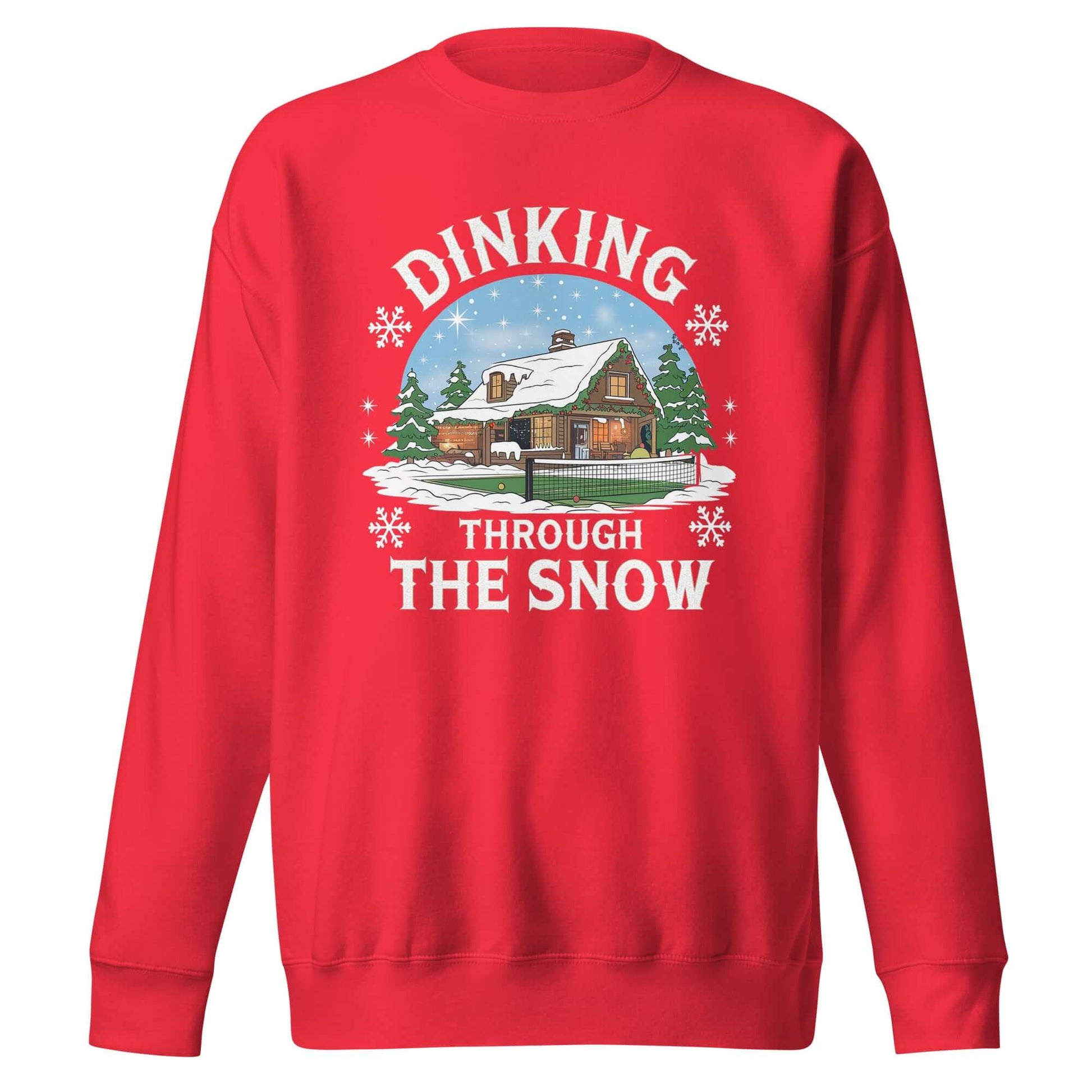 front side of Dinking Through the Snow: Cozy Pickleball Sweatshirt for Holiday Enthusiasts (red)
