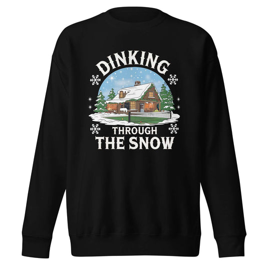 front side of Dinking Through the Snow: Cozy Pickleball Sweatshirt for Holiday Enthusiasts (Black)