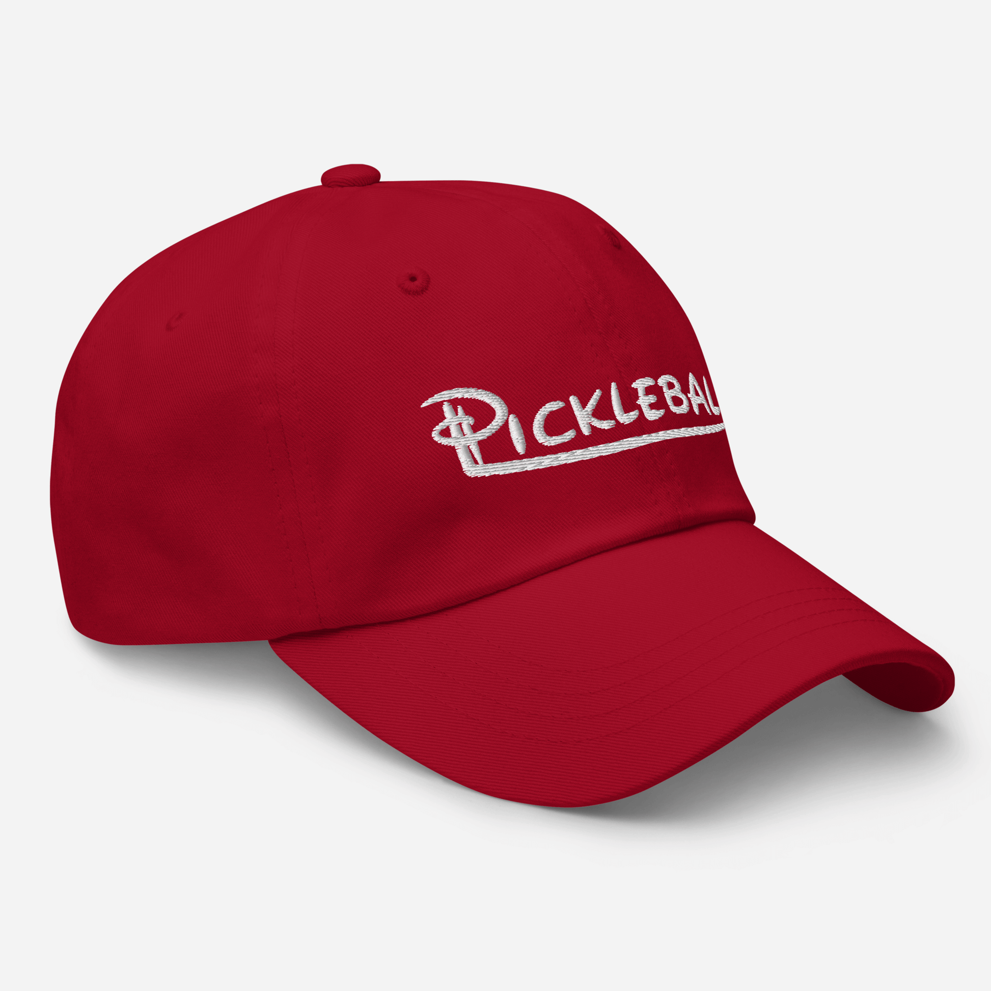Red adjustable pickleball hat with embroidered text and curved visor.