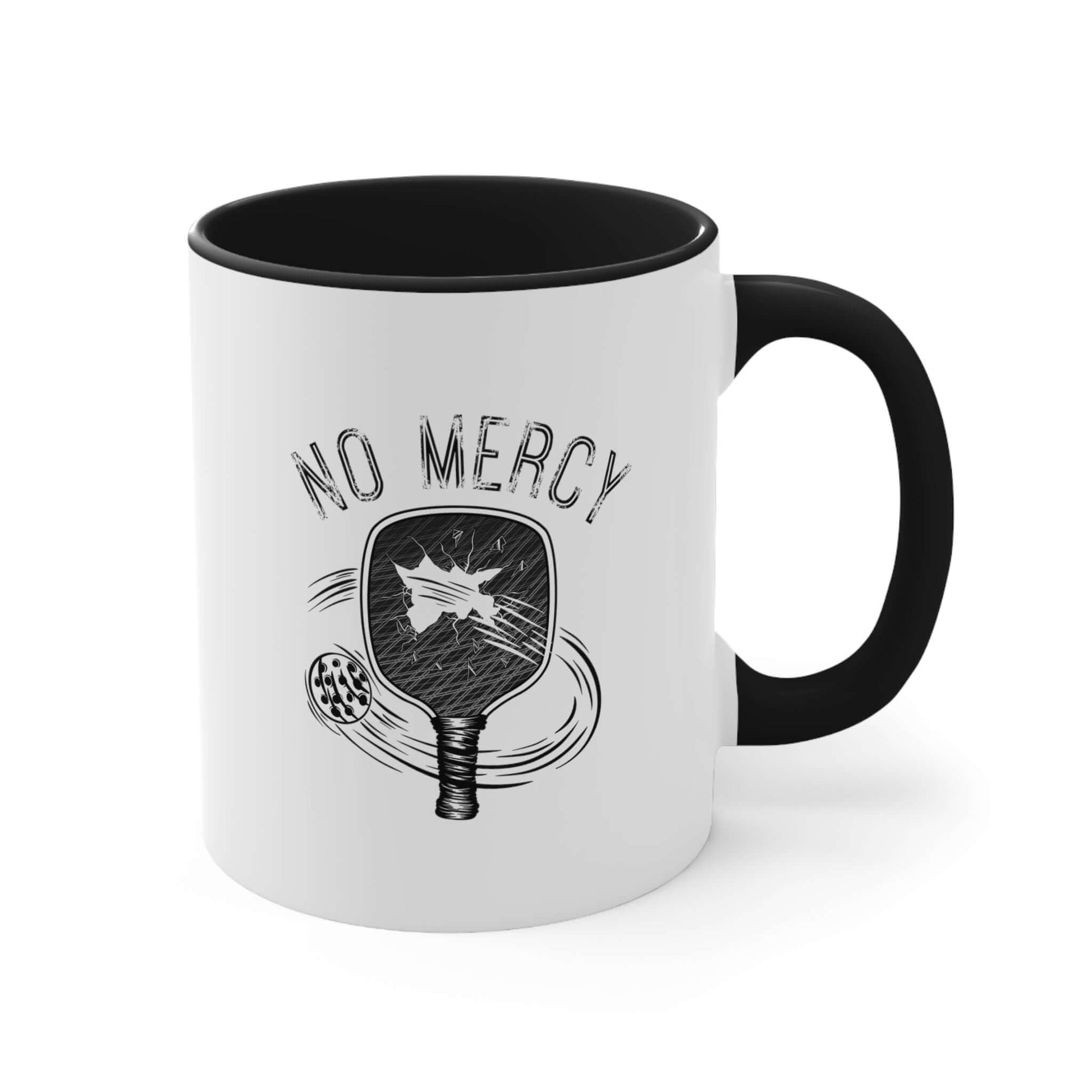 Ceramic 11oz coffee mug with "No Mercy" pickleball paddle design, perfect for pickleball enthusiasts, black handle and interior.