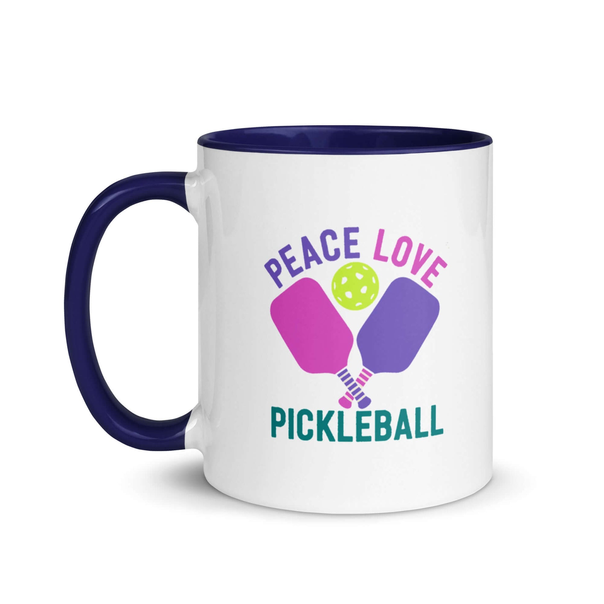 White mug with blue accent featuring 'Peace Love Pickleball' text and colorful paddle graphics.