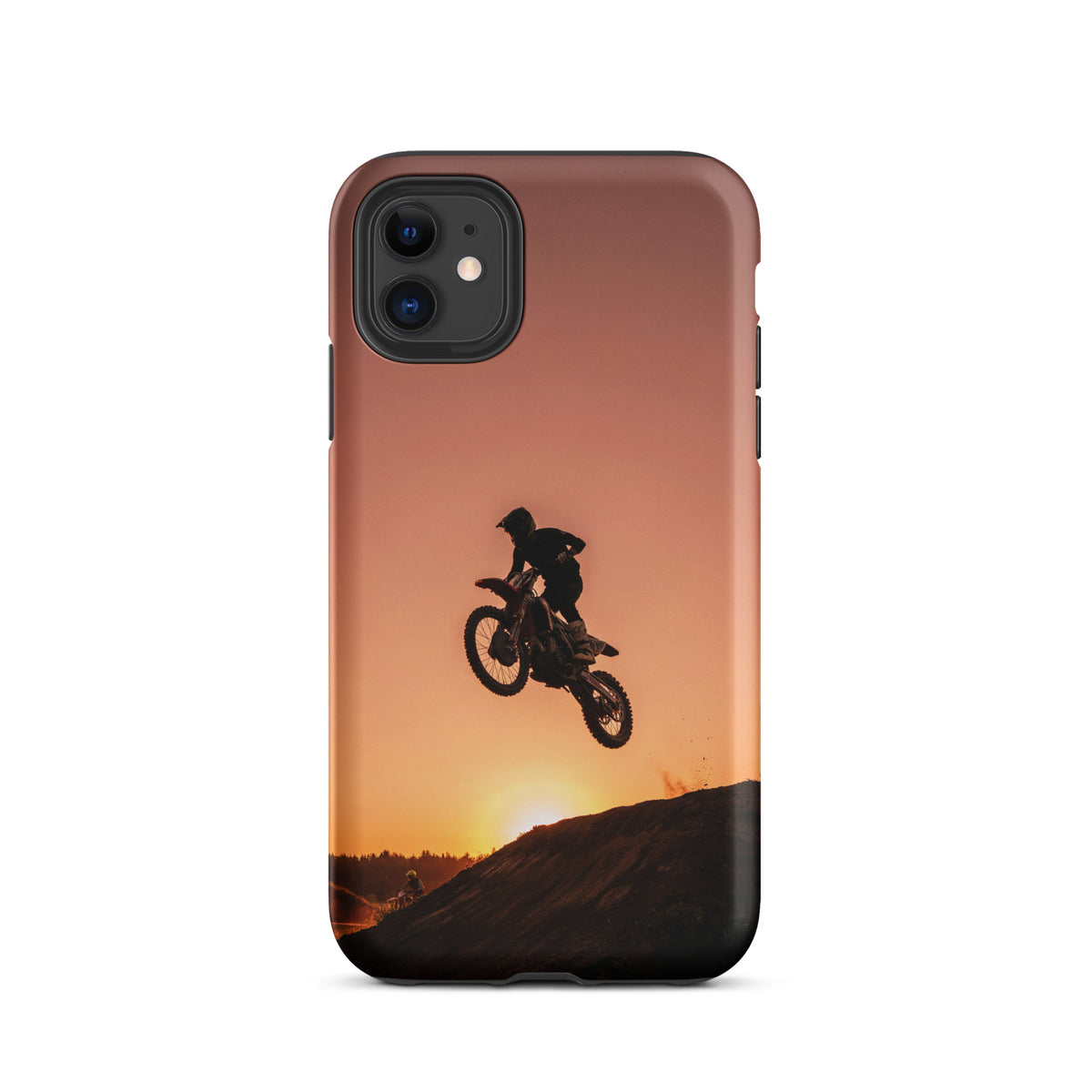 Phone Case for iPhone with motocross dirt bike design at sunset, featuring a dramatic jump against warm copper and burnt orange hues.
