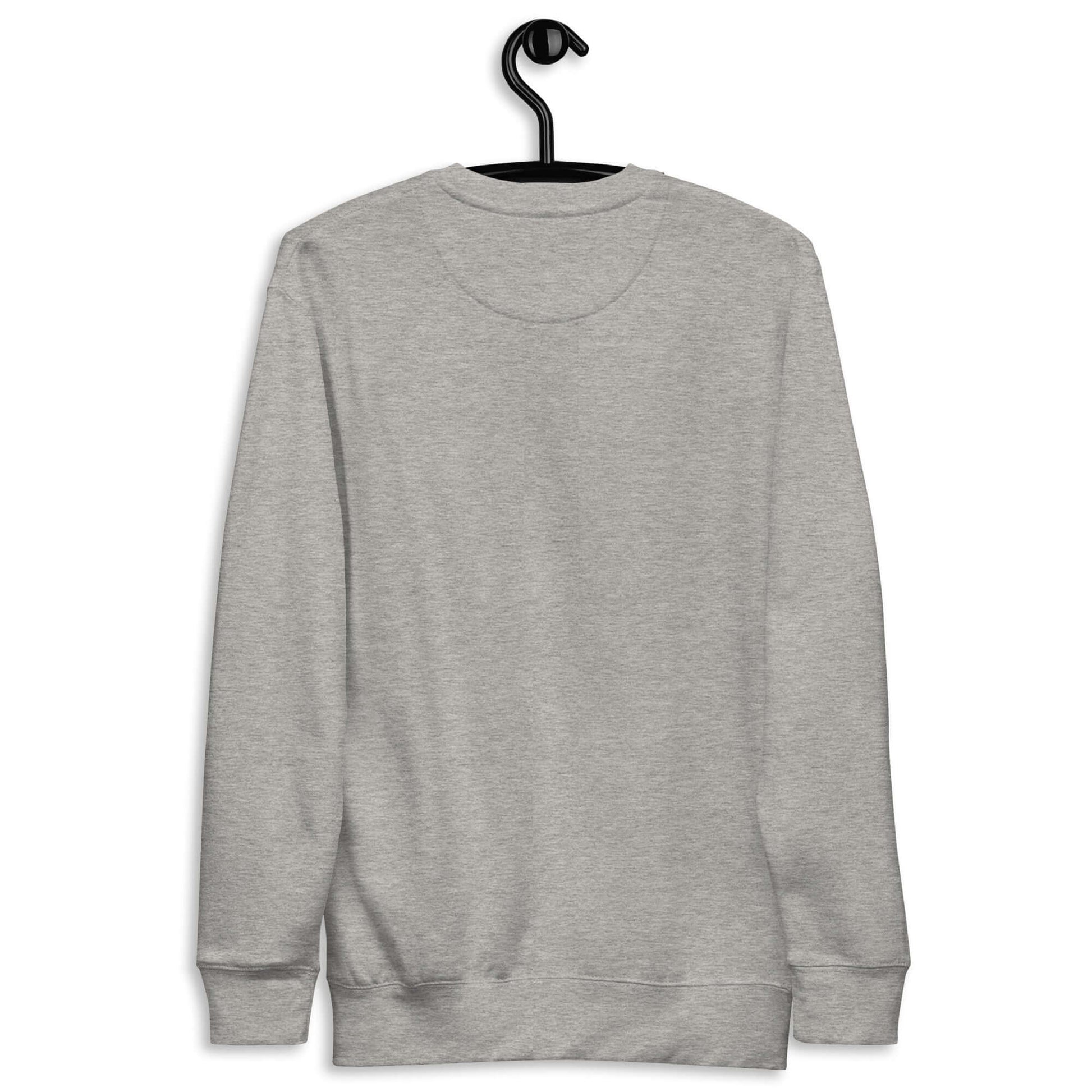 Back view of a gray Women's Peace, Love, Pickleball Premium Sweatshirt on a hanger.