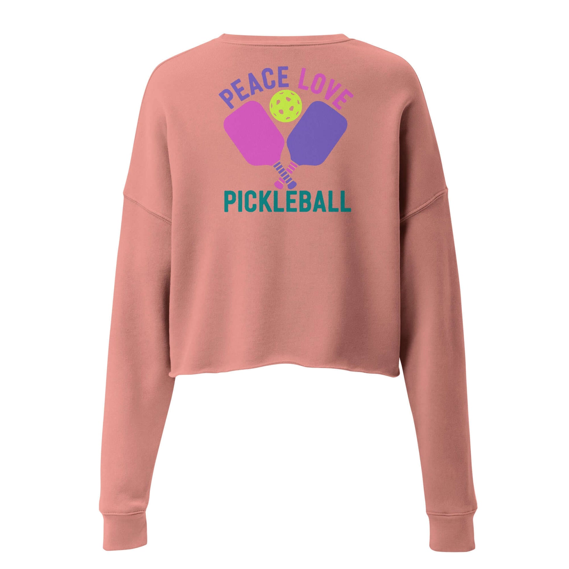 Women's crop sweatshirt in peach with 'Peace Love Pickleball' graphic design on the back.
