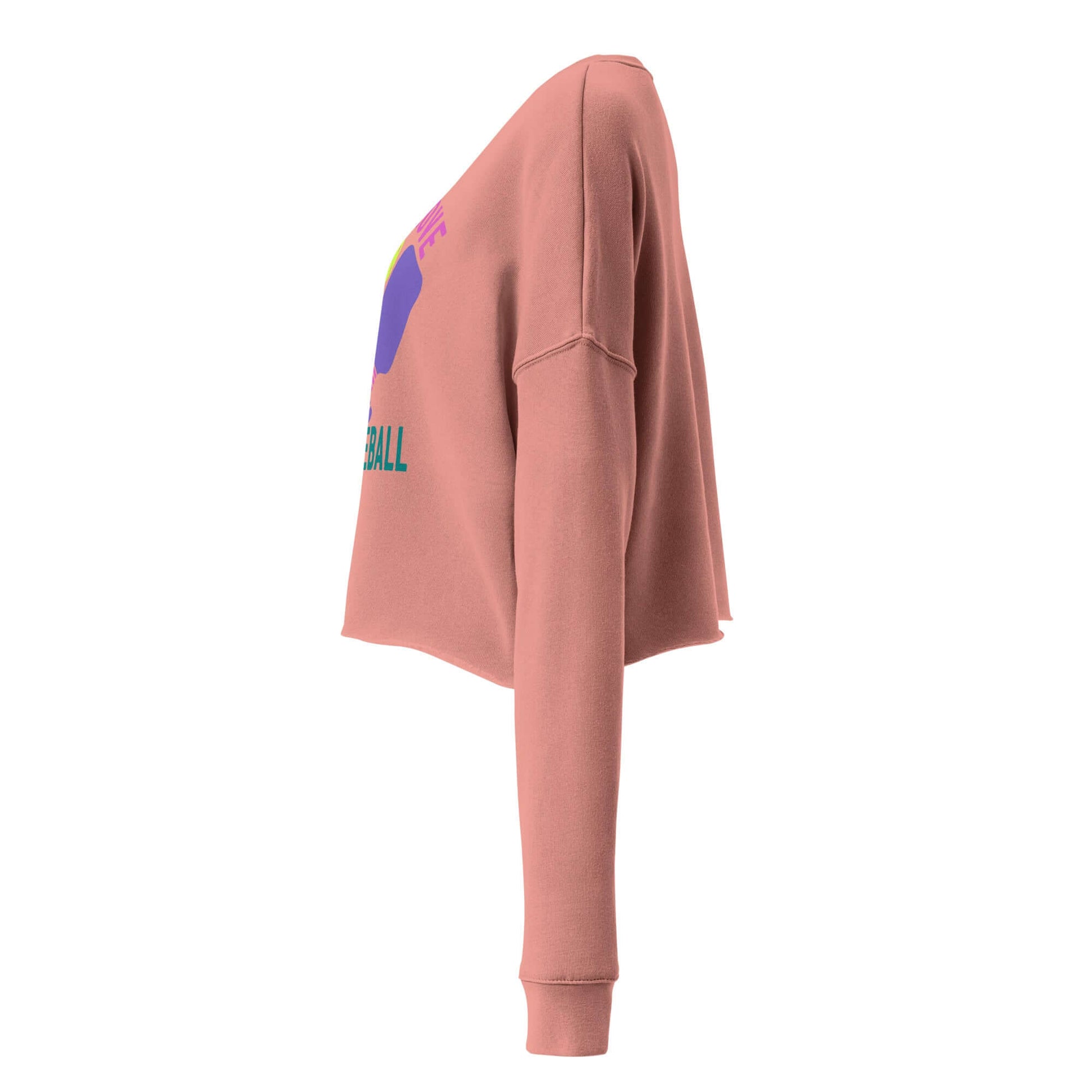 Side view of Women's Peace, Love, Pickleball Crop Sweatshirt in pink, showcasing trendy design and cozy fit.