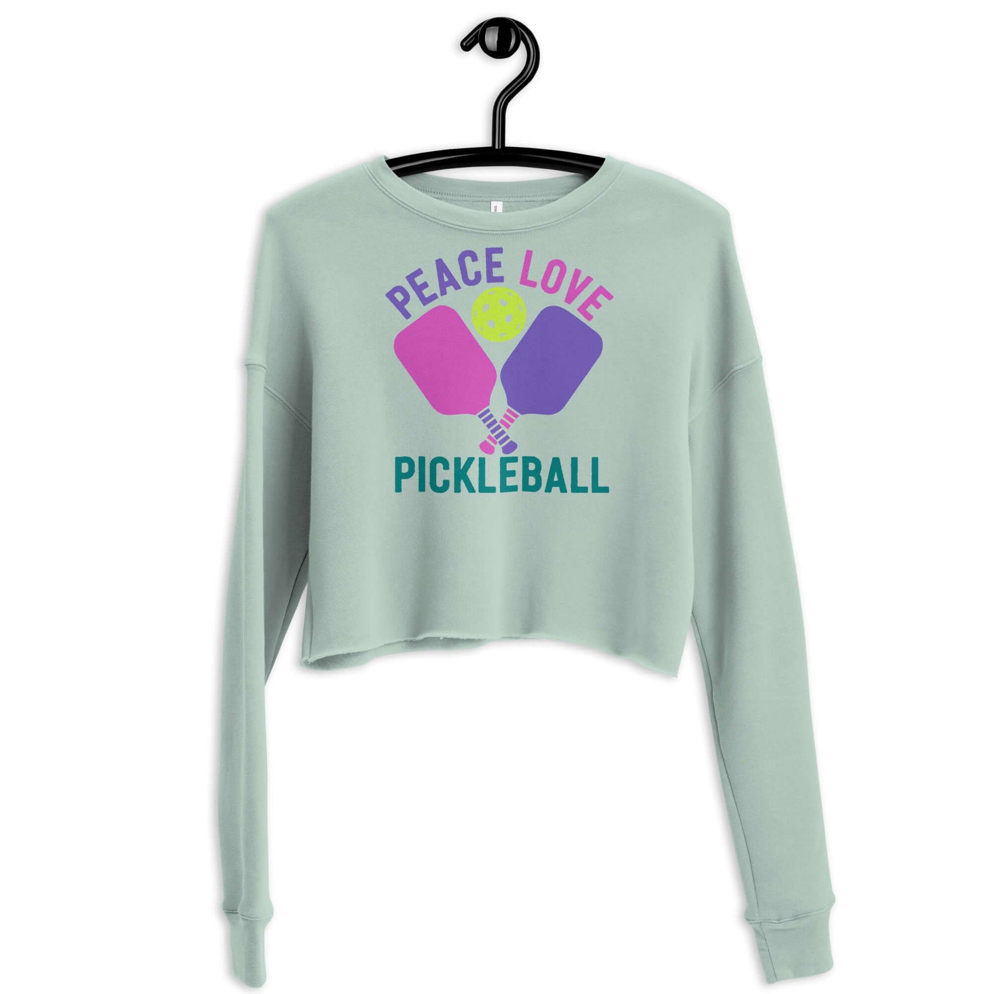 Women's Peace, Love, Pickleball crop sweatshirt in mint green with colorful pickleball graphic.