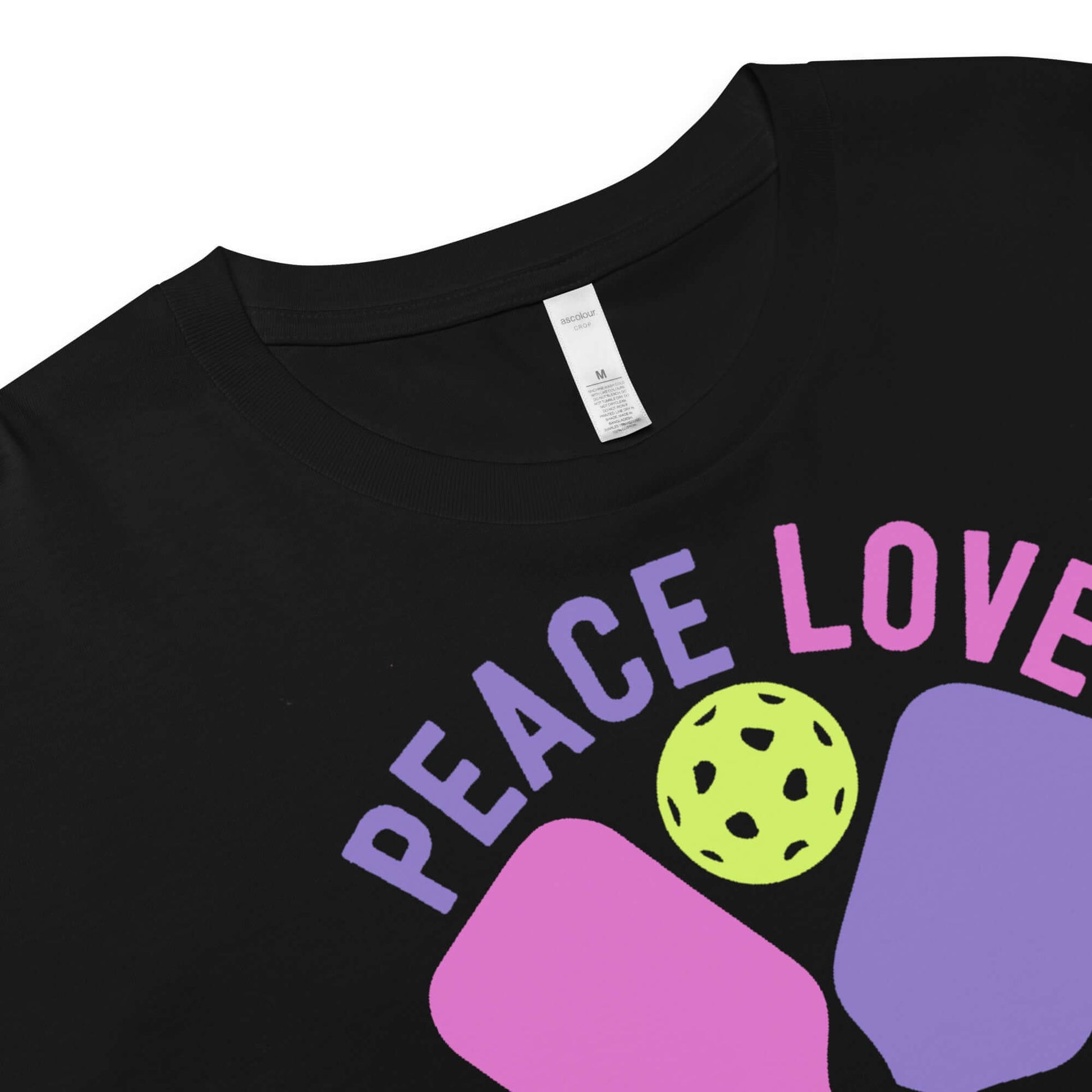 Close-up of Women's Peace, Love, Pickleball Crop Top design featuring vibrant colors and pickleball graphic.