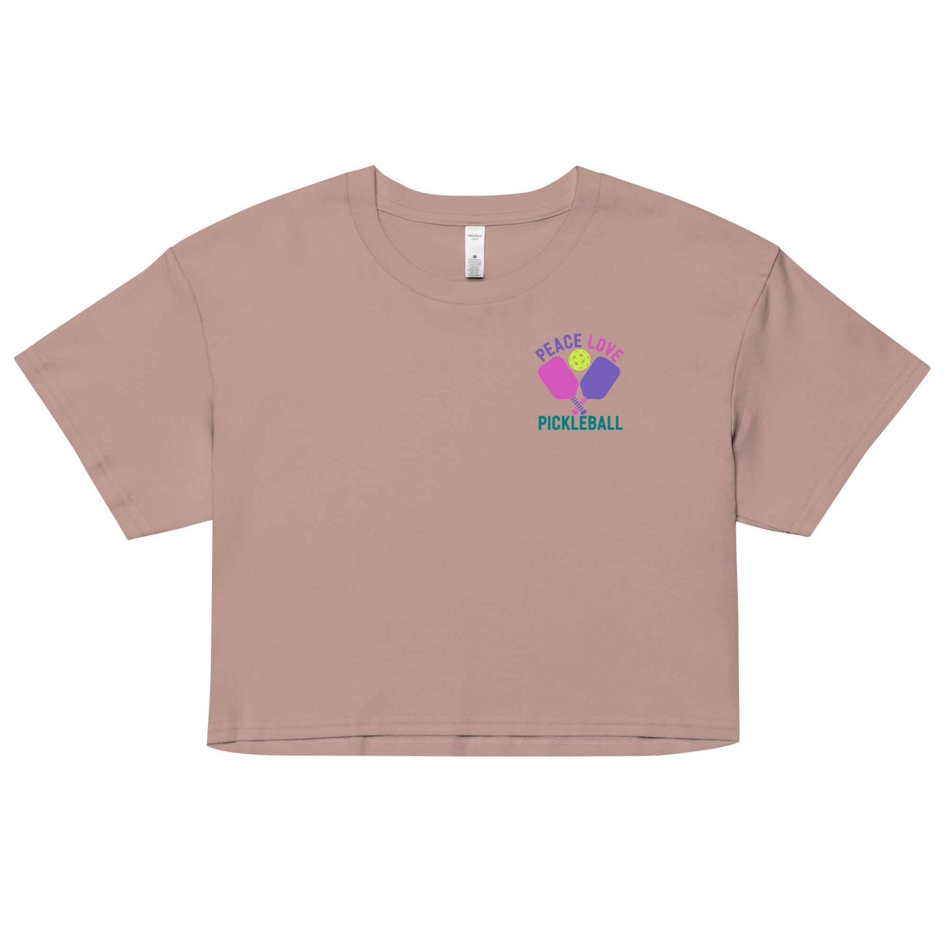 Women's Peace Love Pickleball crop top in light brown, featuring playful pickleball graphic.