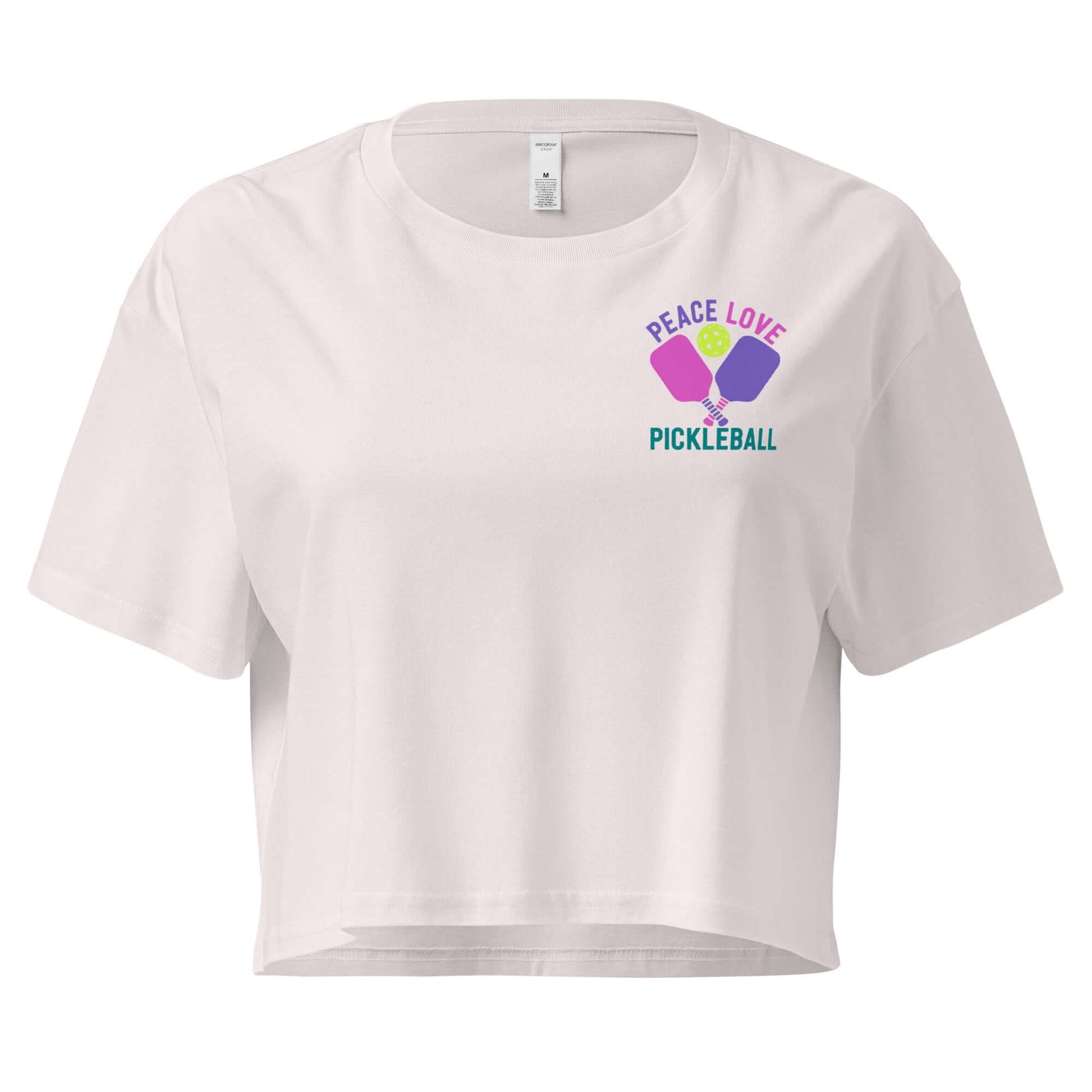 Women's white crop top featuring 'Peace Love Pickleball' graphic design for stylish athletes.