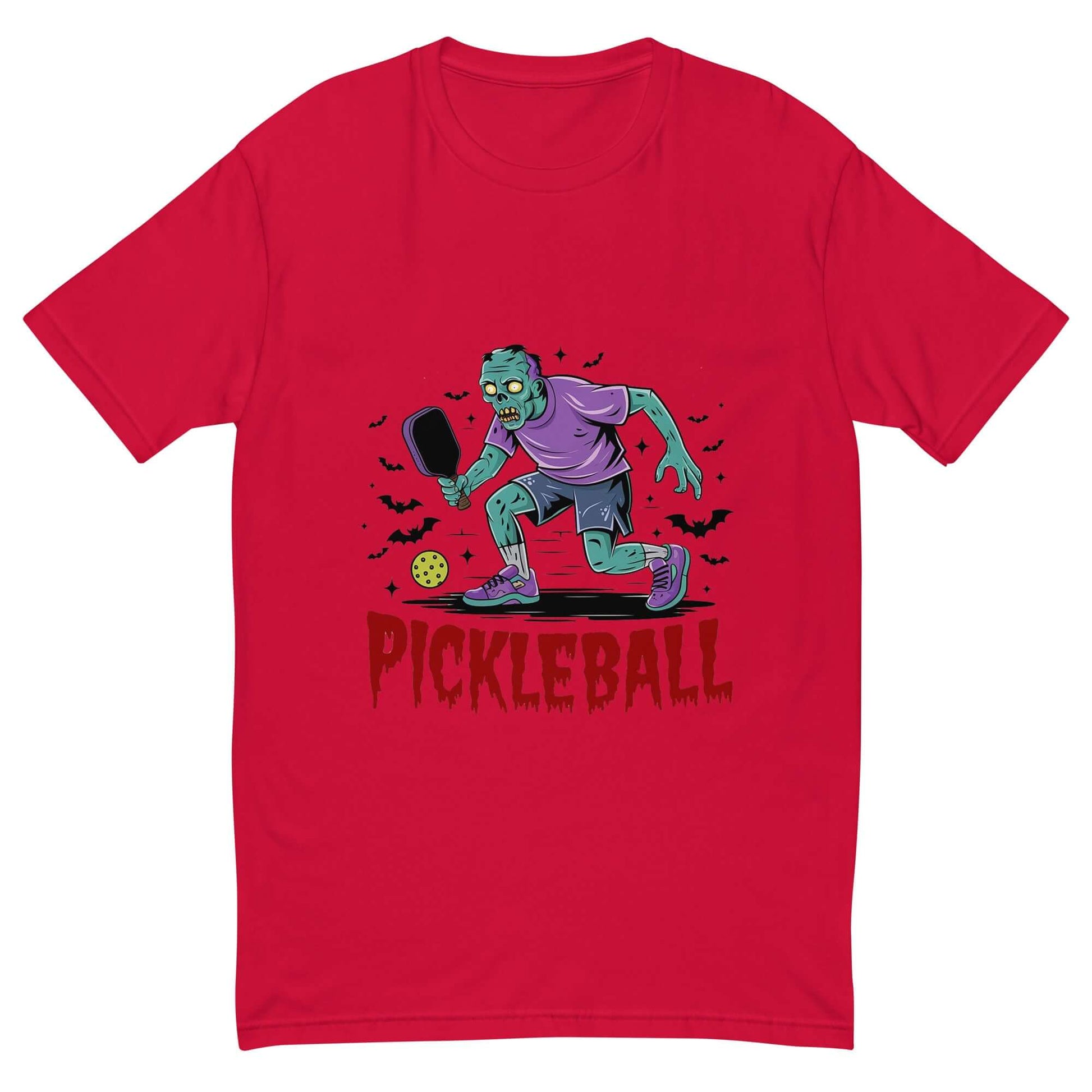 Red t-shirt featuring a Halloween-themed zombie playing pickleball illustration, perfect for spooky sports enthusiasts.