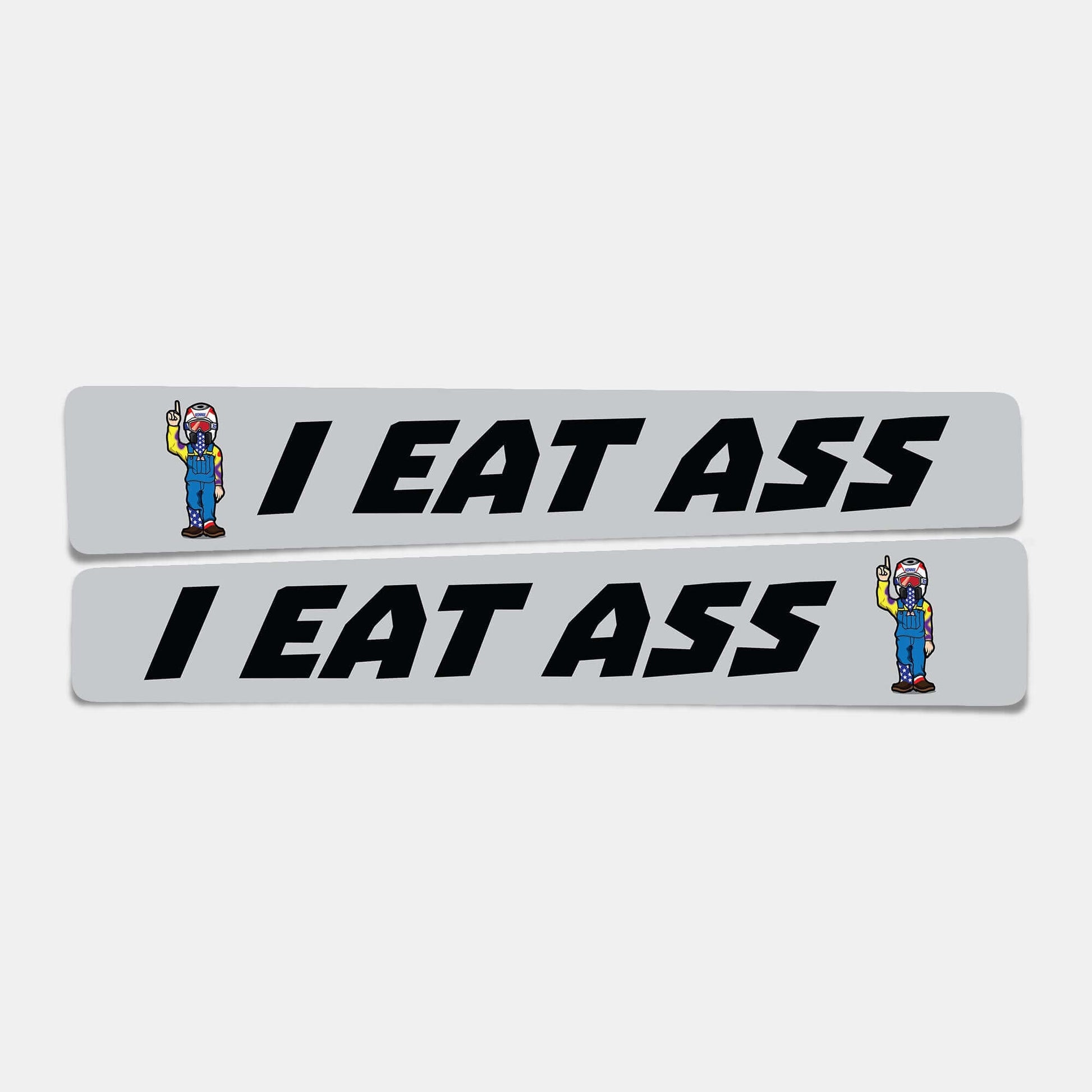 "I EAT ASS swingarm dirt bike decals featuring a cartoon character, perfect for most big bikes, 15 inches in length."